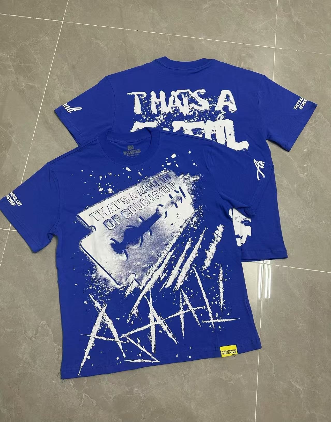 THAT'S A AWFUL LOT OF COUGH SYRUP Blue Graphic T-Shirt — context